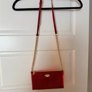 Chic Red Coach Crossbody Bag with Gold Chain